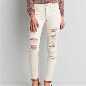 American Eagle Ivory Skinny Ripped Jeans